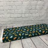 100% coton dinosaure pastel fond vert foncé  ( Dear Stella ) D2739