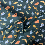 100% coton dinosaure pastel fond vert foncé  ( Dear Stella ) D2739