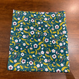 Coupon 91cm coton fleurs sur fond turquoise (vendu tel quel)