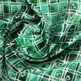 100% coton motif forme géométrique teinte de vert blanc
