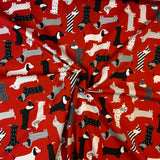 Jersey coton / élasthanne Chien saucisse fond rouge - 1573691